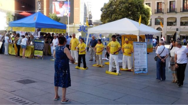 Protests against a “Before State” policy by Falun Gong practitioners in Madrid. Credits.