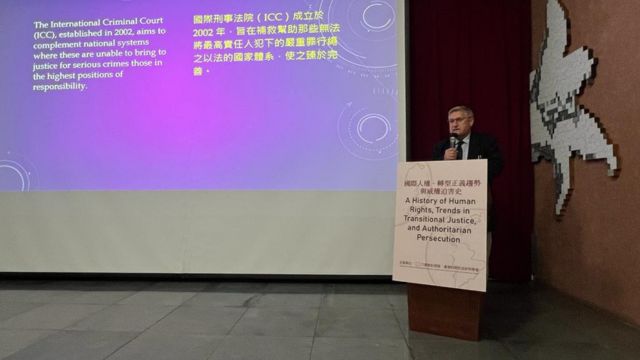 Willy Fautré speaks at the conference.