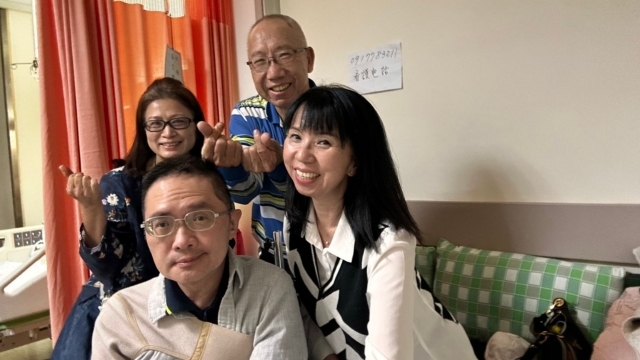 The author with her husband and two other brother and sister.